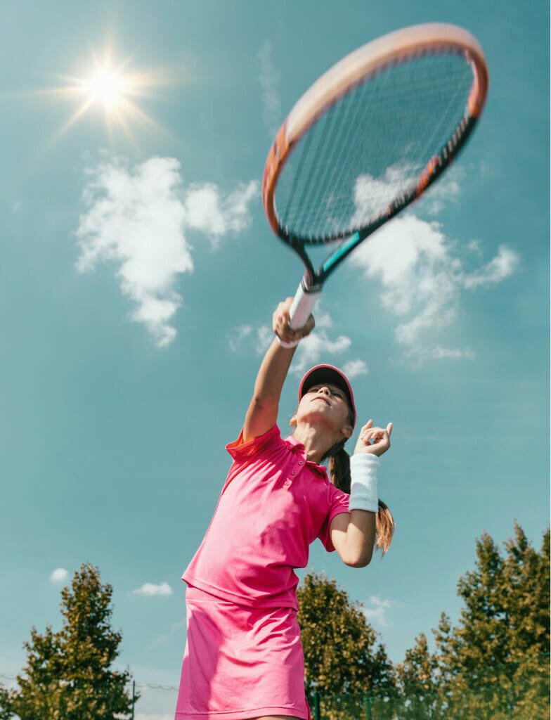 Player serving on an outdoor court